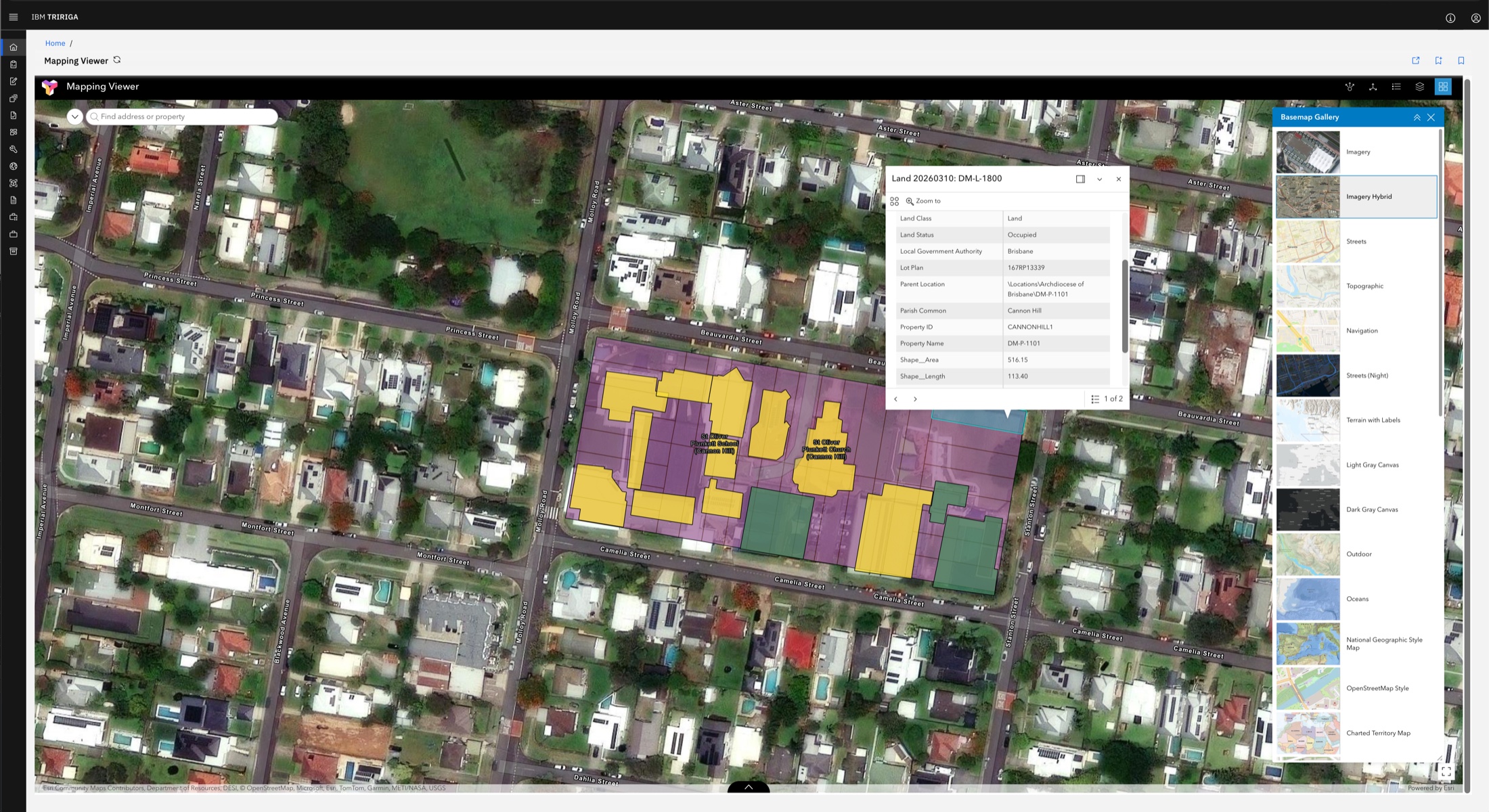IBM TRIRIGA and Esri mapping viewer showing Archdiocese property parcels and buildings over satellite imagery